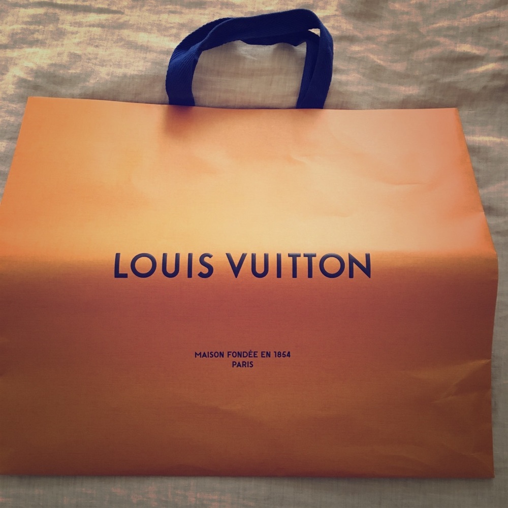 Giant Louis Vuitton shopping bag.